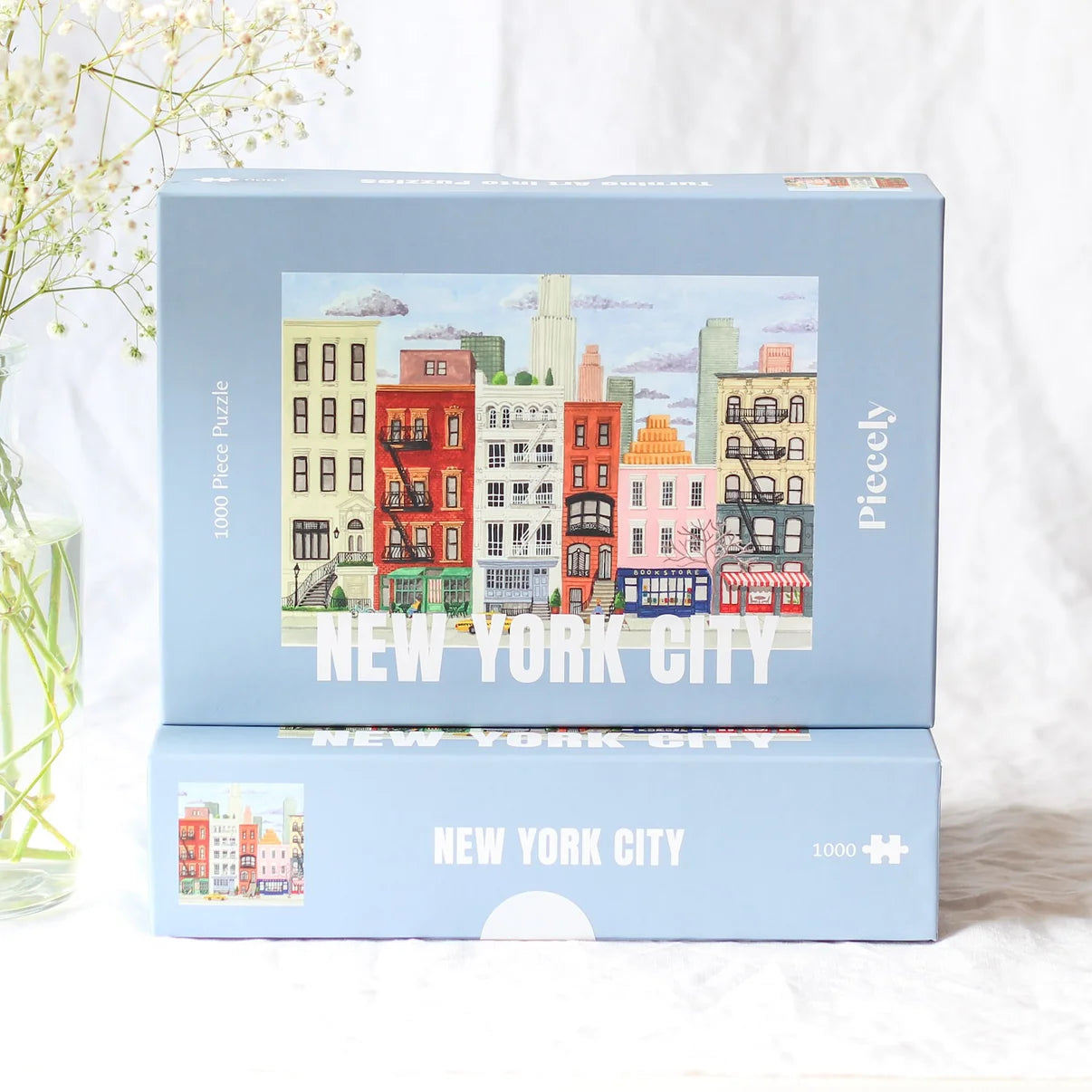 Die Schachtel des nachhaltigen Puzzles New York City mit dem aufgedruckten Motiv einer New Yorker Straße. 