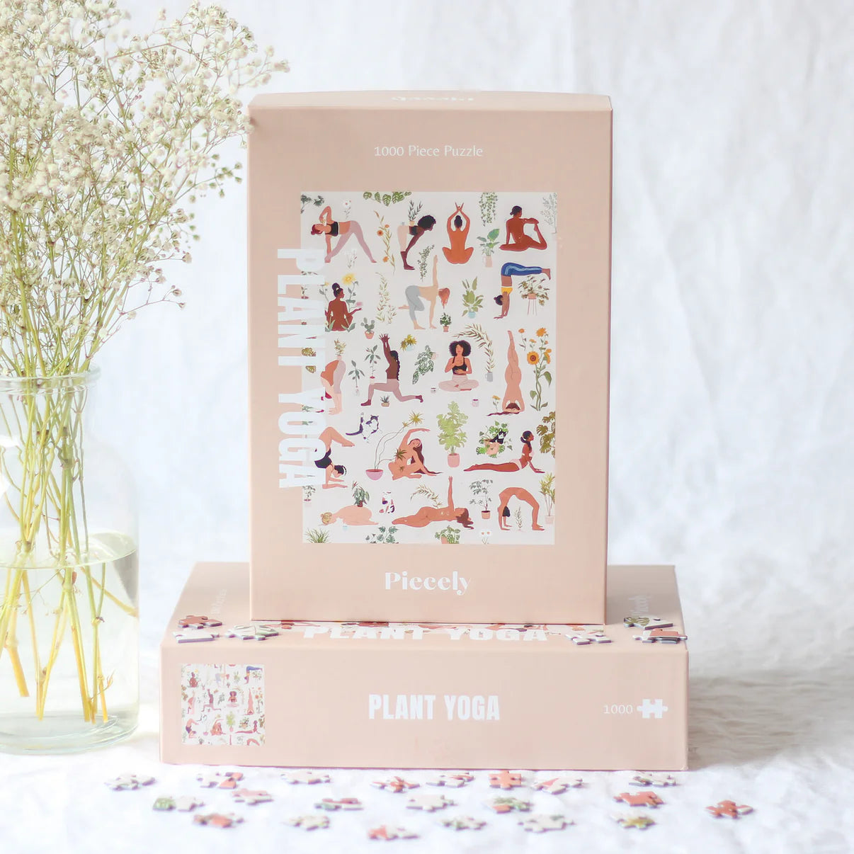 Schachtel des nachhaltigen Puzzles Plant Yoga mit Frauen in Yogaposen und Pflanzen. 